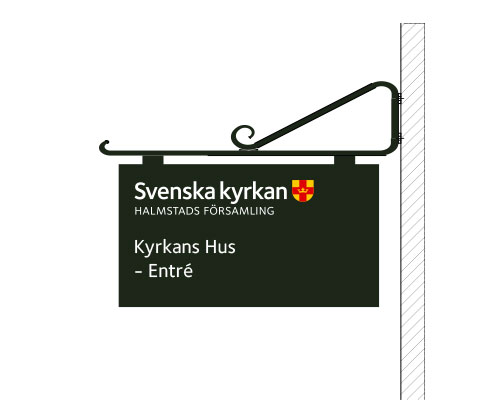 Flaggskylt på kyrkovägg
